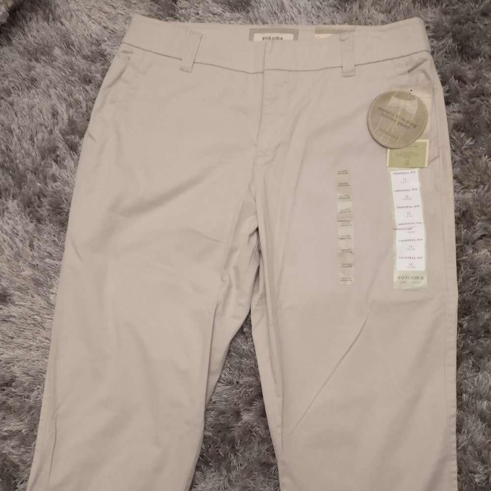 NWT original fit khakis, instantly slimming.